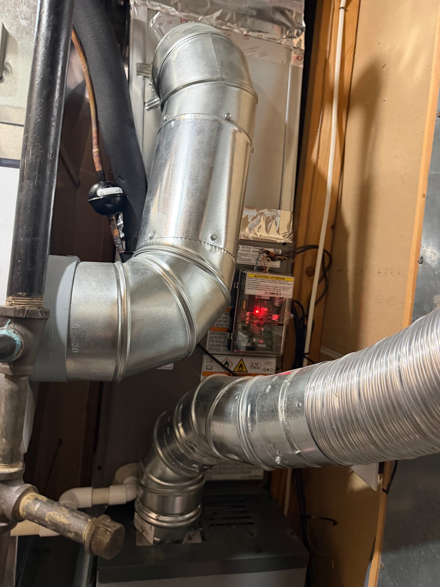 Furnace venting rework by Alvizo Heating & Cooling in Prairie Village, KS