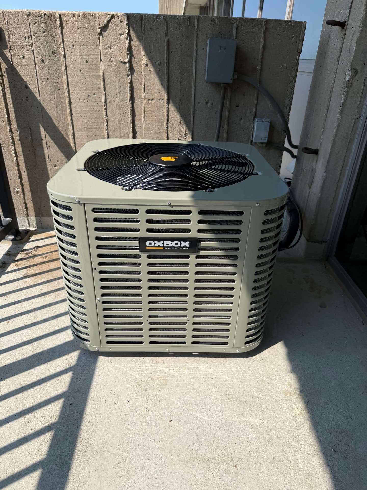 New AC condenser set by Alvizo Heating & Cooling in Lenexa, KS